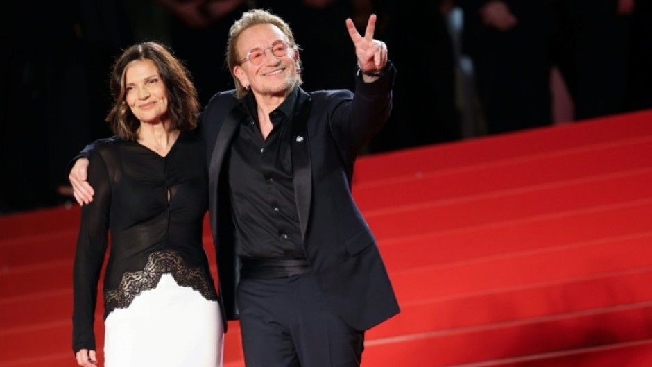 U2 frontman Bono with his wife Irish activist Ali Hewson at the Cannes premiere of his new film