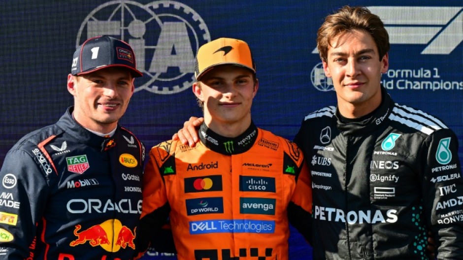 (From L) Second-placed Red Bull Racing's Max Verstappen, first-placed McLaren's Oscar Piastri and third-placed Mercedes' George Russell after qualifying for the Emilia Romagna Formula One Grand Prix at Imola