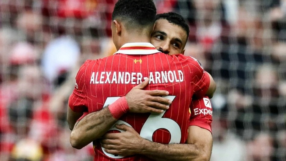 Mohamed Salah (R) celebrates with Trent Alexander-Arnold after equalising for Liverpool against Crystal Palace.