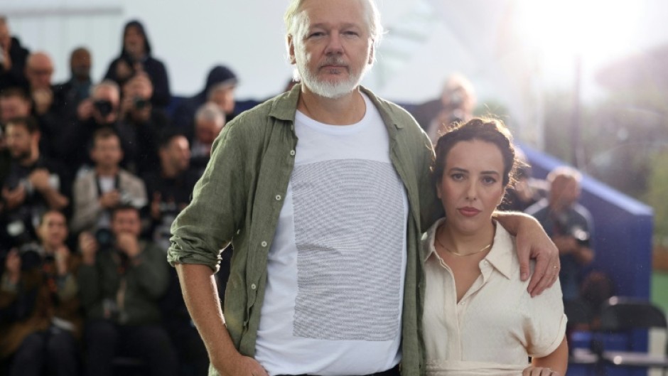 Assange with his wife Stella promoting the film "The Six Billion Dollar Man" at the Cannes film festival