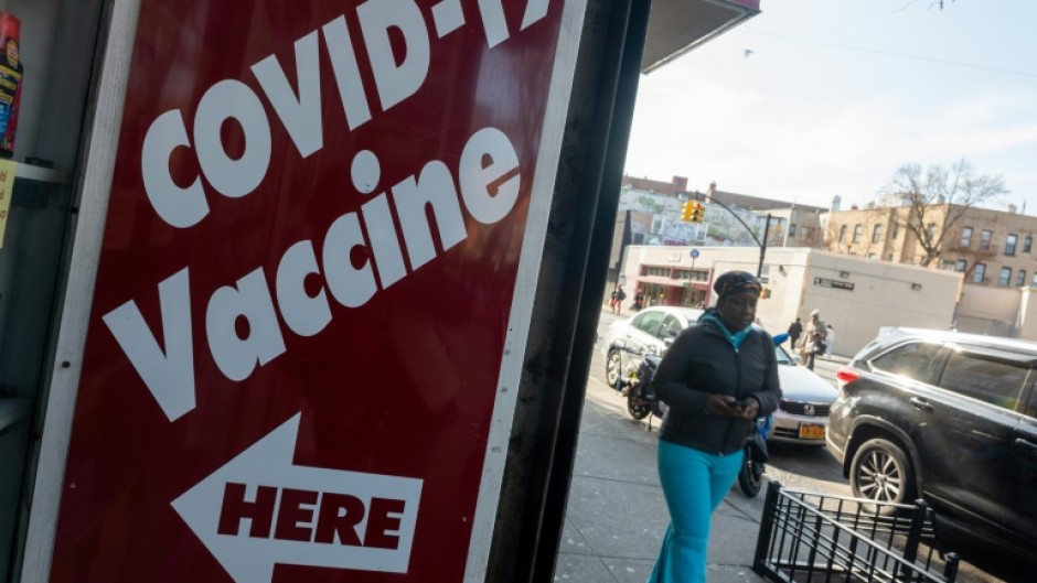 A pharmacy advertises the COVID-19 vaccine as the nation marks the fifth anniversary of the Covid-19 pandemic on March 13, 2025 in New York City