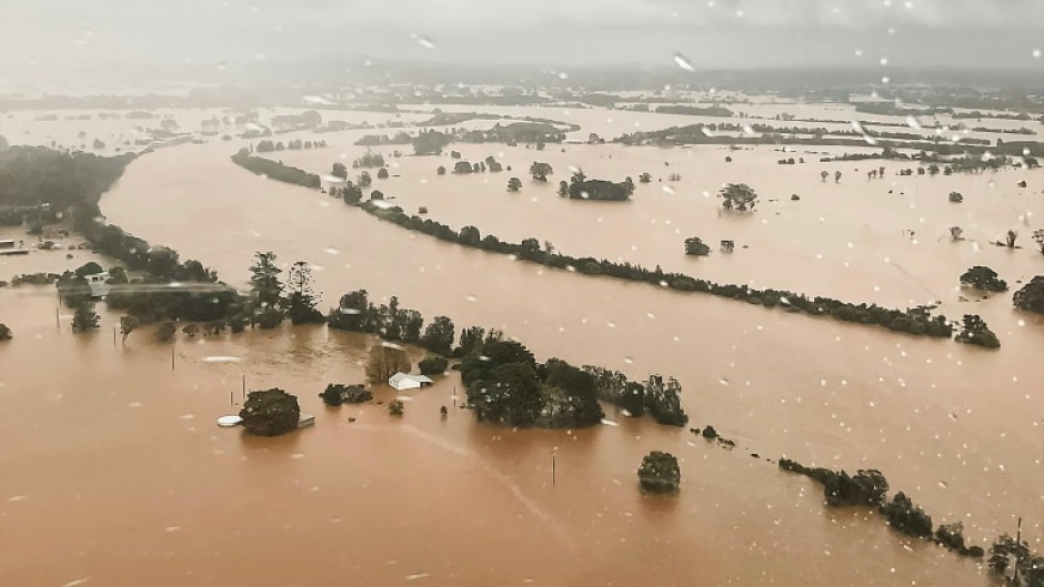 One man was found dead in a flooded home in eastern Australia