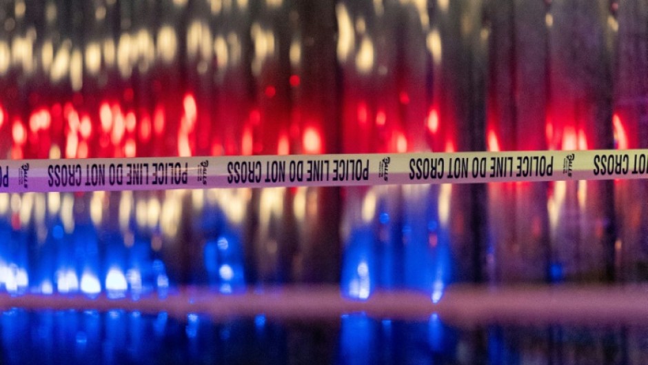 Police tape is seen outside the Capital Jewish Museum following a shooting that left two people dead, in Washington, DC, in the early hours of May 22, 2025