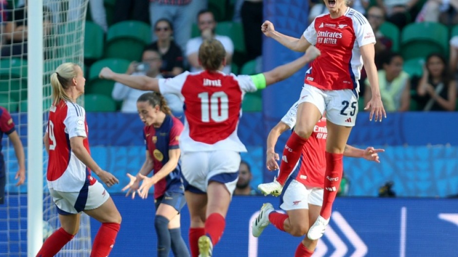 Arsenal's Swedish striker Stina Blackstenius celebrates with team-mates after netting in the women's Champions League final