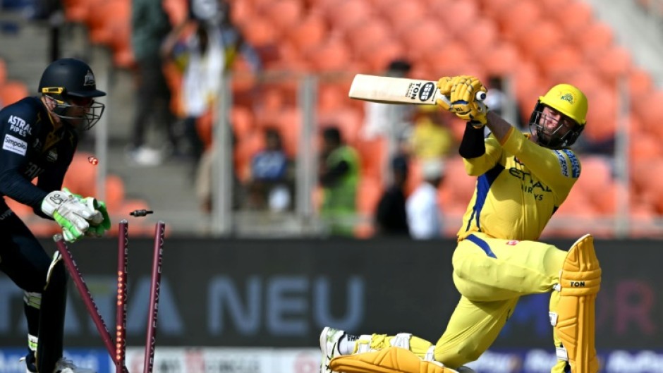 Chennai Super Kings' Devon Conway hammered 52 from 35 balls before he was clean bowled by Gujarat's Rashid Khan