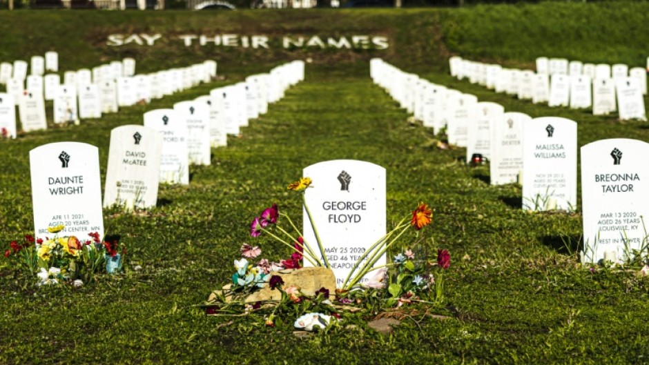 George Floyd is among model headstones bearing the names of people killed by law enforcement in the 'Say Their Names' cemetery in Minneapolis