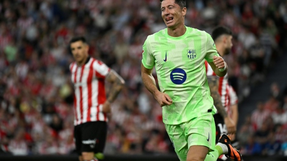 Barca's Robert Lewandowski netted twice to pass a century of goals for the club