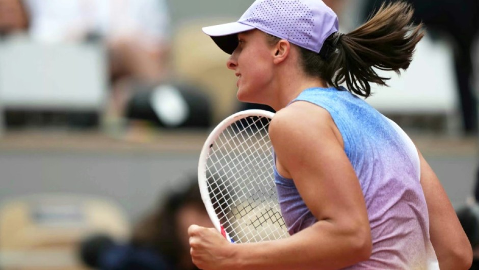 Poland's Iga Swiatek celebrates her first-round victory over Slovakia’s Rebecca Sramkova