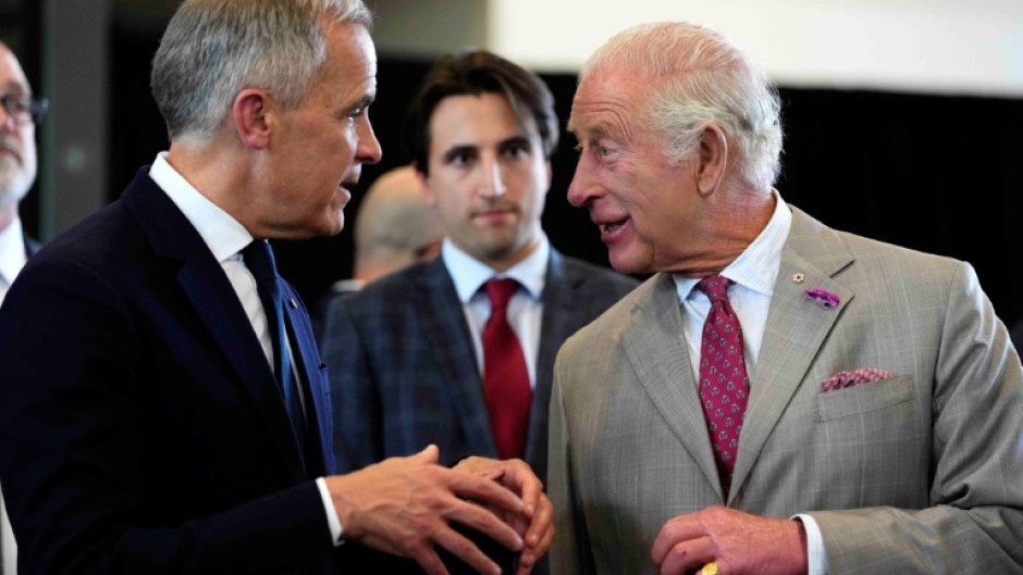 Canada's Prime Minister Mark Carney (L) has said he intends to use the visit of Britain's King Charles III to highlight Canada's sovereignty