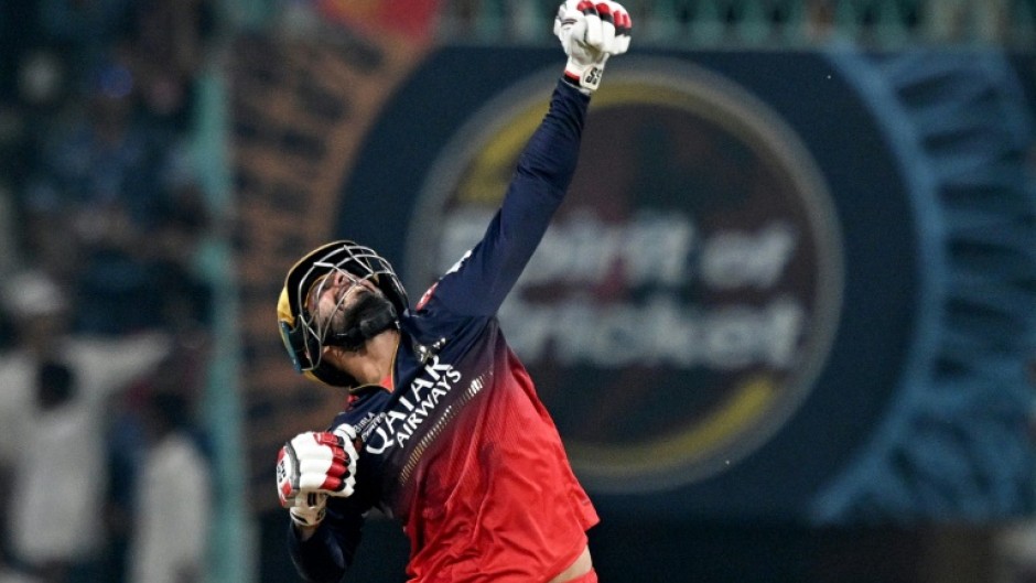 Royal Challengers Bengaluru's Jitesh Sharma celebrates his team's win against Lucknow Super Giants in the Indian Premier League