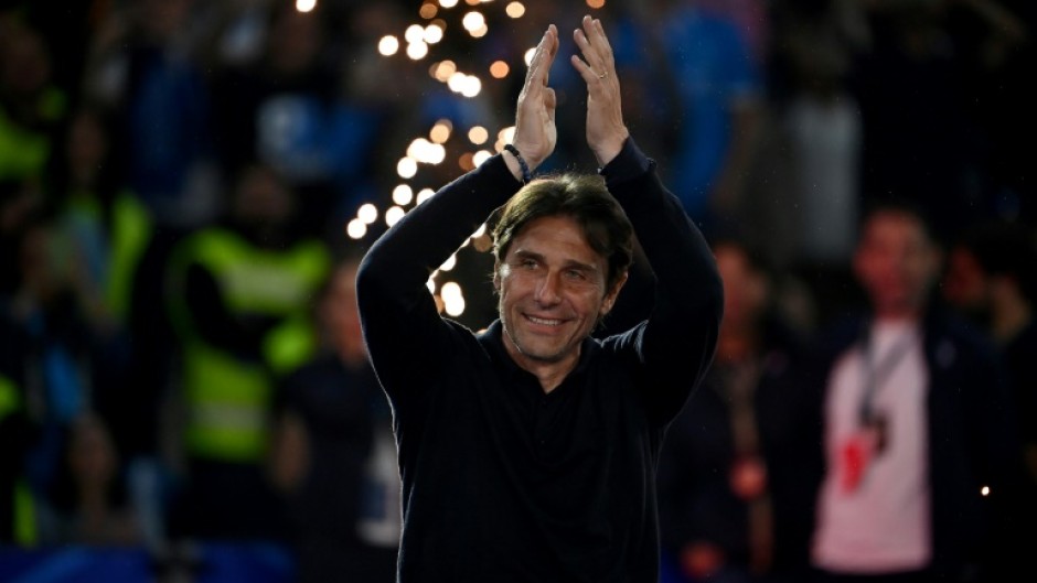 Antonio Conte will stay on as Napoli coach after winning the Serie A title