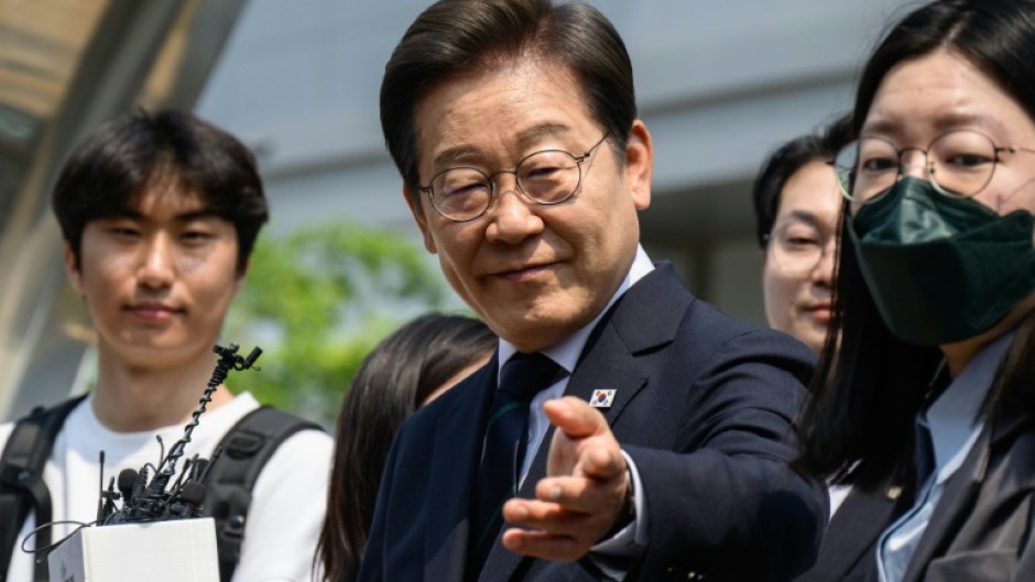 Both frontrunner Lee  of the liberal Democratic Party and conservative challenger Kim Moon-soo have cast the race as a battle for the soul of the country