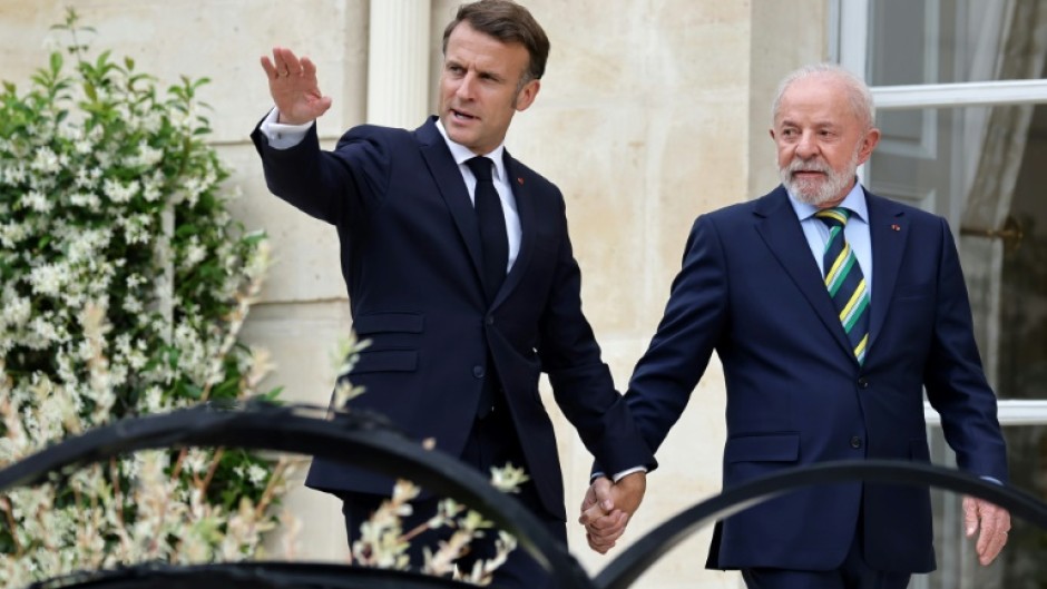 President Emmanuel Macron stressed that Kyiv and Moscow should not be treated as equals