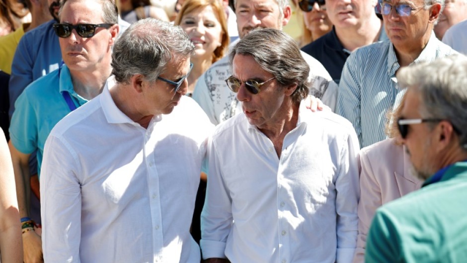 Spain's former prime minister Jose Maria Aznar appeared alongside the current head of the PP, Alberto Nunez Feijoo, at the rally
