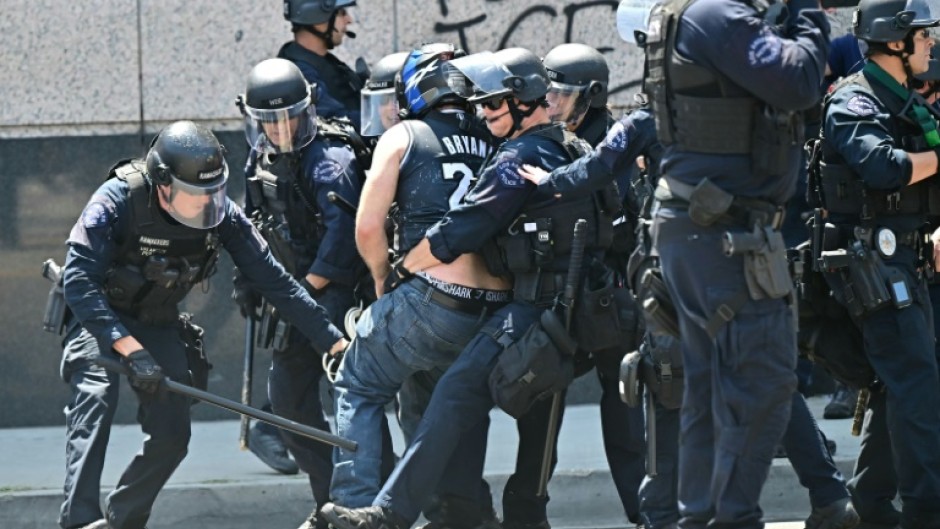 Law enforcement clashed with demonstrators outside the Metropolitan Detention Center, MDC, during a protest following federal immigration operations