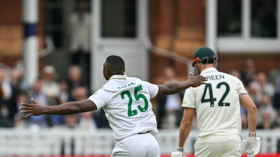 South Africa's Kagiso Rabada celebrates taking the wicket of Australia's Cameron Green on the first morning of the World Test Championship final at Lord's