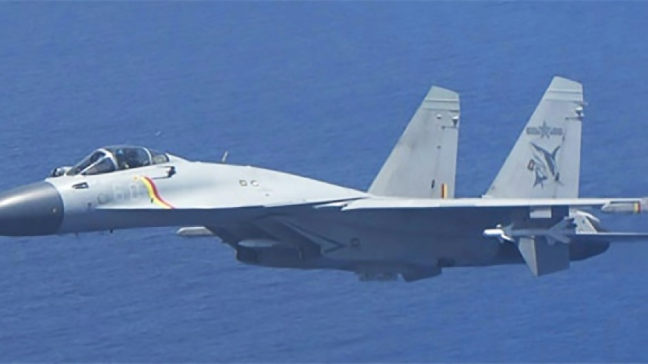 China and Japan traded barbs after a Chinese J-15 fighter jet followed a Japanese patrol plane at the weekend