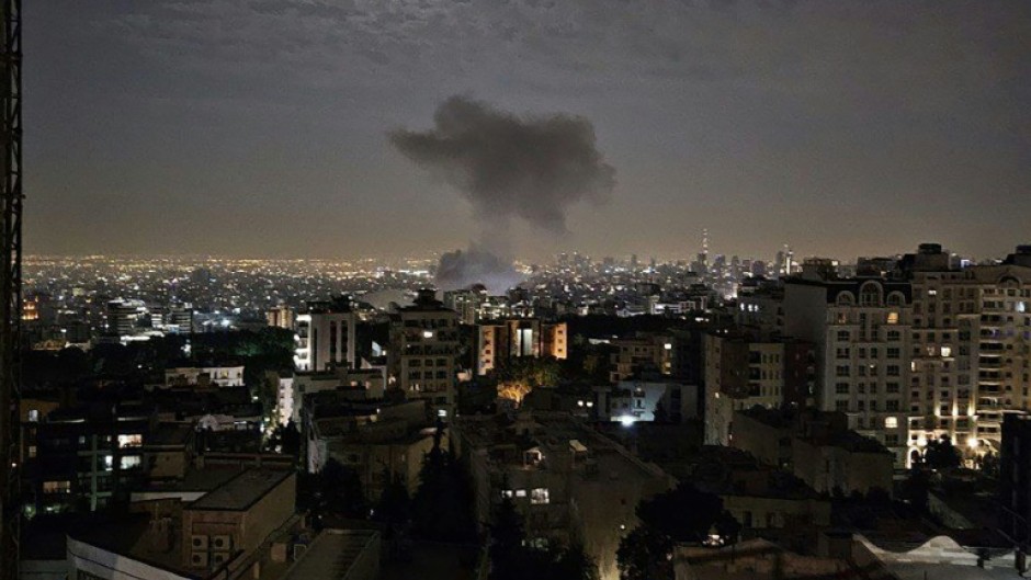 A photo by Iran's Revolutionary Guard Corps (IRGC) official Sepah News Telegram channel on June 13, 2025 shows smoke billowing from a site reportedly targeted by an Israeli strike in the Iranian capital Tehran