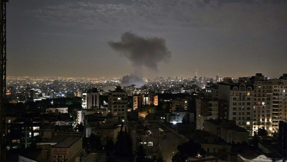 A photo by Iran's Revolutionary Guard Corps (IRGC) official Sepah News Telegram channel on June 13, 2025 shows smoke billowing from a site reportedly targeted by an Israeli strike in the Iranian capital Tehran