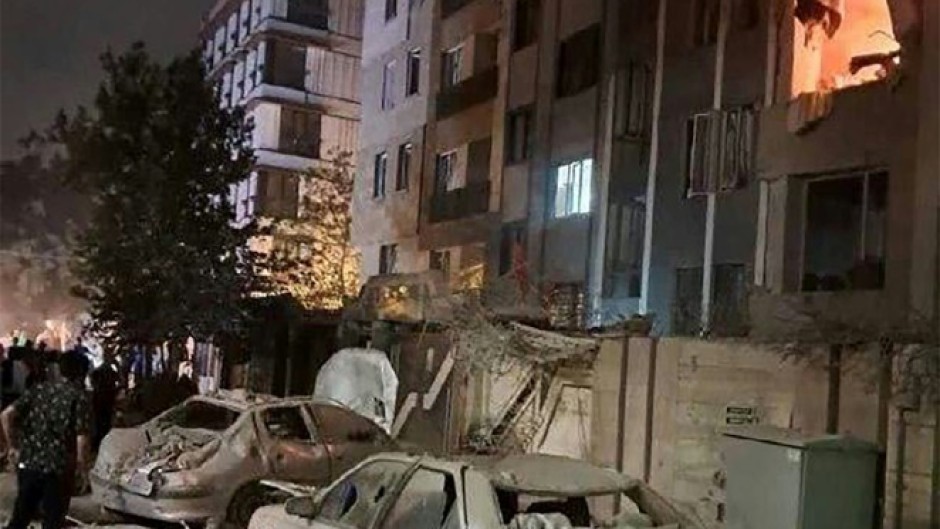 This handout photo released by Iran's Revolutionary Guard Corps (IRGC) official Sepah News Telegram channel on June 13, 2025 reportedly shows a building in Tehran hit in an Israeli strike
