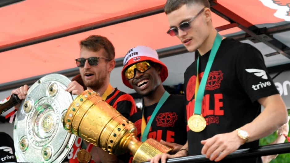Florian Wirtz (right) inspired Leverkusen to a German league and cup double in 2023/24