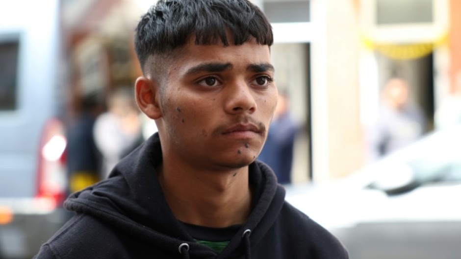19-year-old Hiren Kantilal said his cousin, Vishwash Kumar Ramesh, had waited for about 10 to 15 minutes seeking his brother, and then was whisked away to hospital by the rescue services