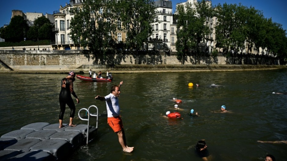 Flags will inform bathers about pollution levels in the water, particularly "on days following heavy rainfall," said Paris city official Pierre Rabadan.