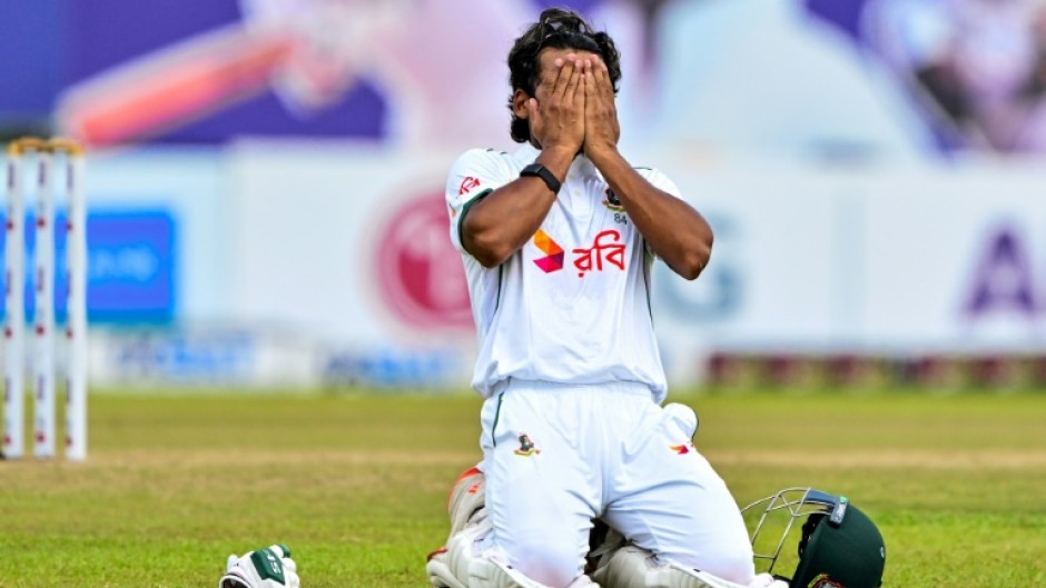 Bangladesh's captain Najmul Hossain Shanto celebrates after scoring a century during the fifth and final day of the first Test cricket match against Sri Lanka