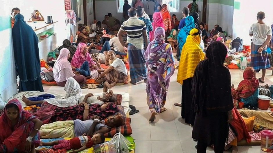 Dengue patients along with their family members are pictured at a hospital in Barguna in southern Bangladesh