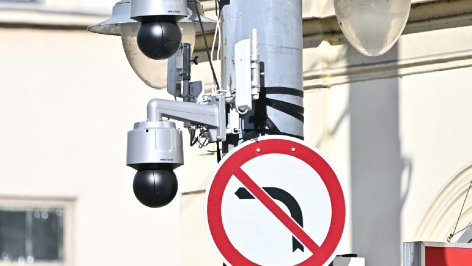 Newly installed cameras have appeared on lamp posts along the planned route of the march
