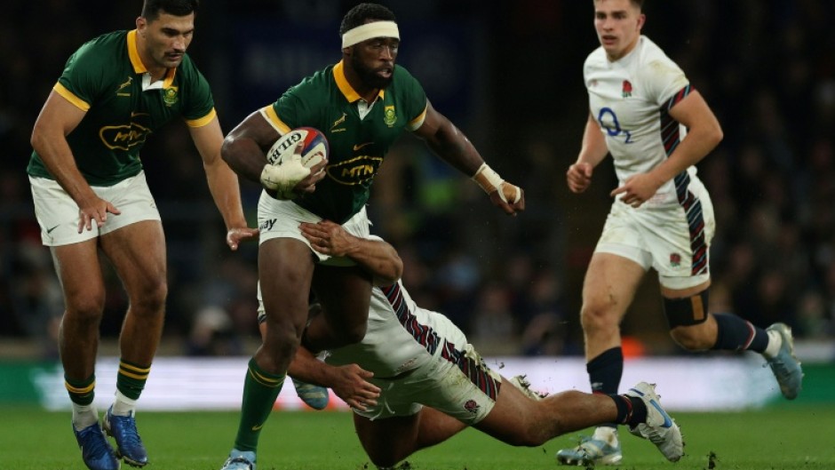 Double World Cup winner Siya Kolisi (C) will lead South Africa against the Barbarians.