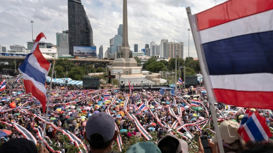 Around 4,000 demonstrators filled roads ringing the capital's Victory Monument, waving Thai flags and cheering for speeches interspersed with live music