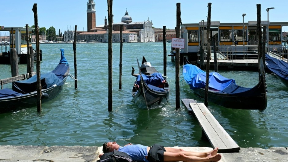 Scientists warn that humanity's burning of fossil fuels is causing ever-hotter summers