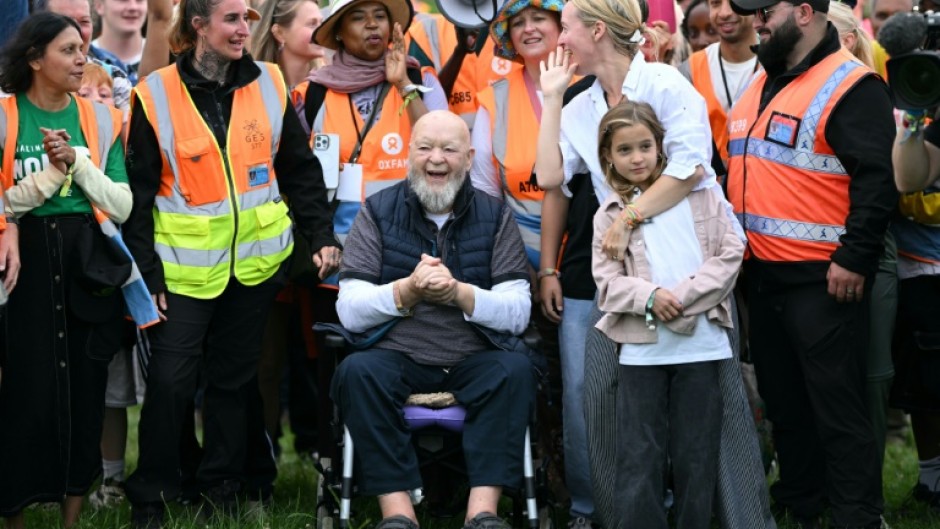 'People that don't like the politics of the event can go somewhere else,' says Glastonbury co-founder Michael Eavis (centre)