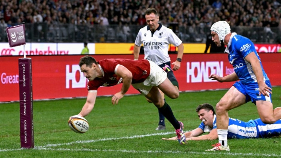 British and Irish Lions' scrum-half Tomos Williams (L) has been ruled out of their Australia tour with a hamstring injury