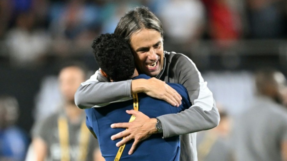 Al Hilal's Italian head coach Simone Inzaghi celebrates following his team's Club World Cup upset over Manchester City