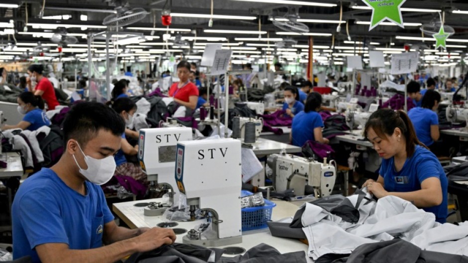 US President Donald Trump announced that Vietnam, a global manufacturing hub dependent on exports, has struck a trade deal that would see its exports to the United States face a minimum 20 percent tariff, while opening its market to US products