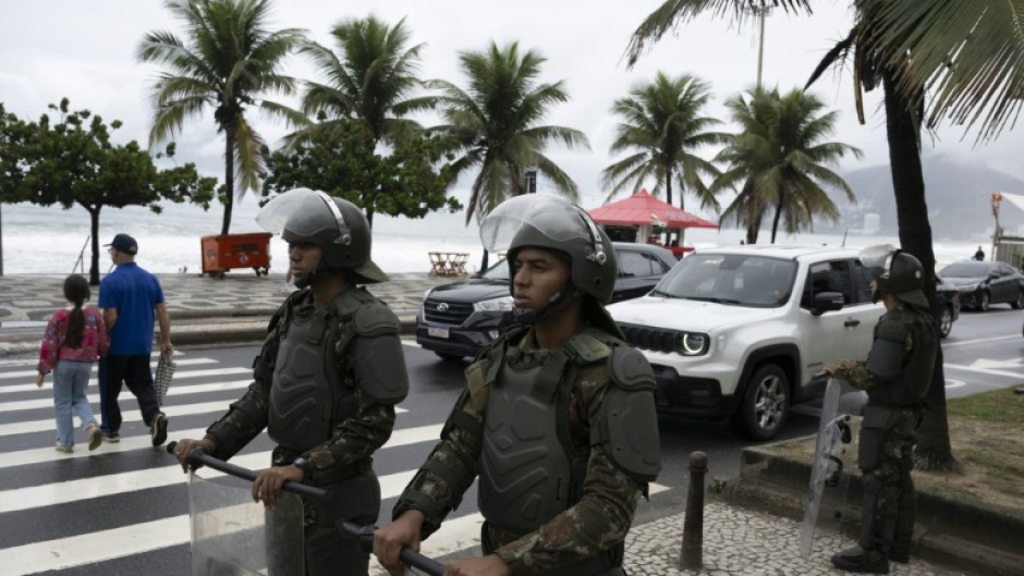 Brazilian soldiers patrol Ipanema beach during security operations ahead of the 2025 BRICS summit in Rio de Janeiro