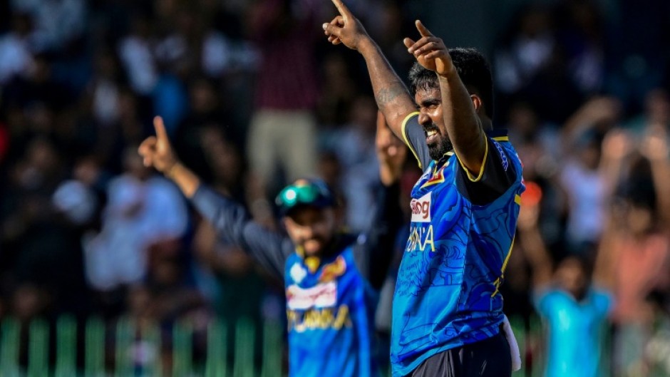 Sri Lanka's Asitha Fernando celebrates after taking the wicket of Bangladesh's Shamim Hossain