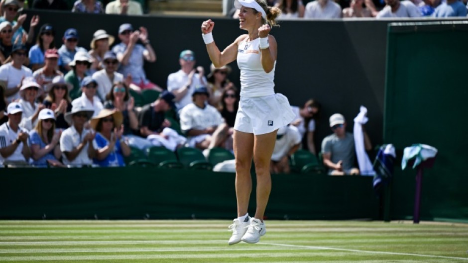 Germany's Laura Siegemund celebrates after beating Madison Keys at Wimbledon