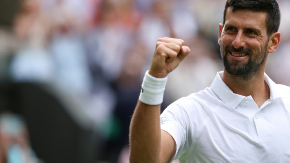 Novak Djokovic celebrates his win over Australia's Alex de Minaur to reach the Wimbledon quarter-finals