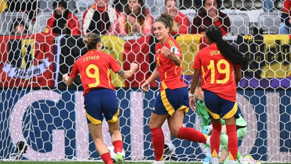 Alexia Putellas (C) celebrating with Esther Gonzalez (9) and Vicky Lopez (19) after scoring the opening goal for Spain against Belgium
