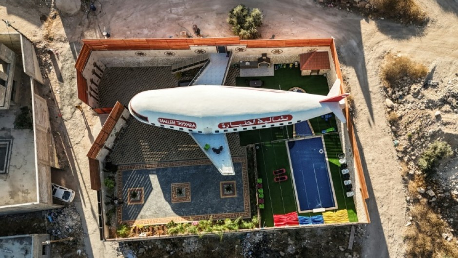 This aerial view shows a guest house built in the shape of an aeroplane in the Palestinian town of Qaffin, in the northwest of the occupied West Bank