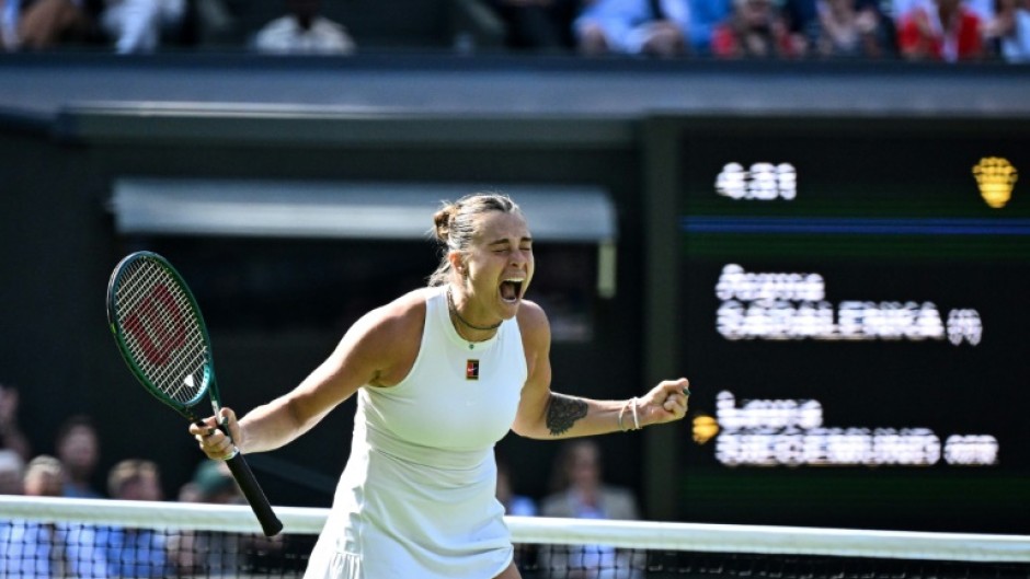 Aryna Sabalenka celebrates after beating Laura Siegemund at Wimbledon