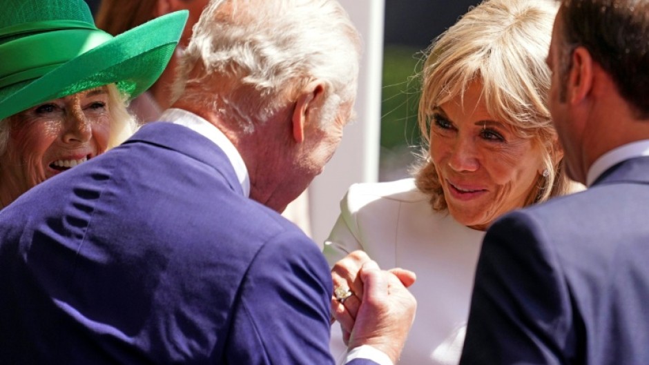 Underlining their ease in each other's company the two couples' exchanges were demonstrably friendly and natural despite a meticulous protocol