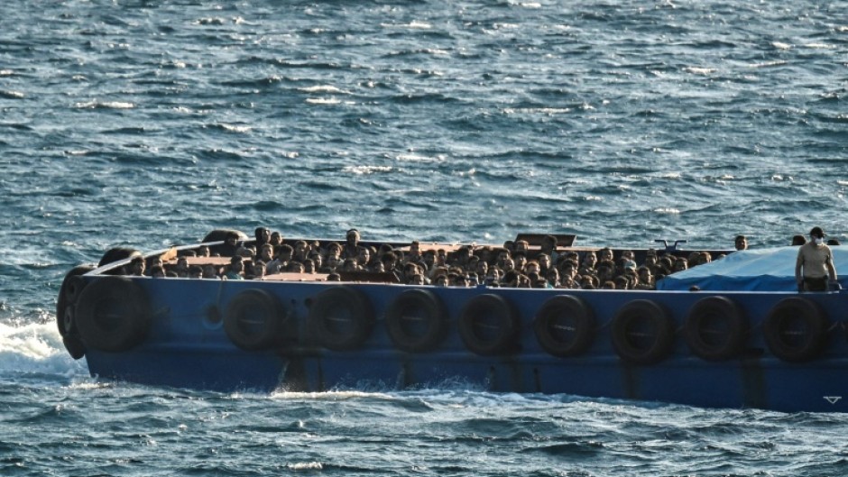 The freeze on asylum claims has been criticised by rights groups as a violation of international and EU law