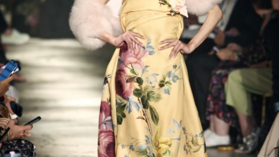 Chinese model Yilan Hua presents a rose-embellished creation for Elie Saab