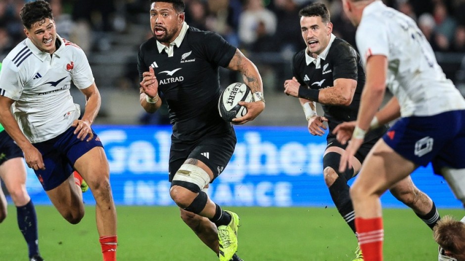New Zealan captain Ardie Savea breaks with the ball against France in Wellington