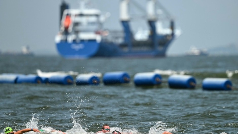 Swimmers compete in the men's 10km in the sea off Singapore