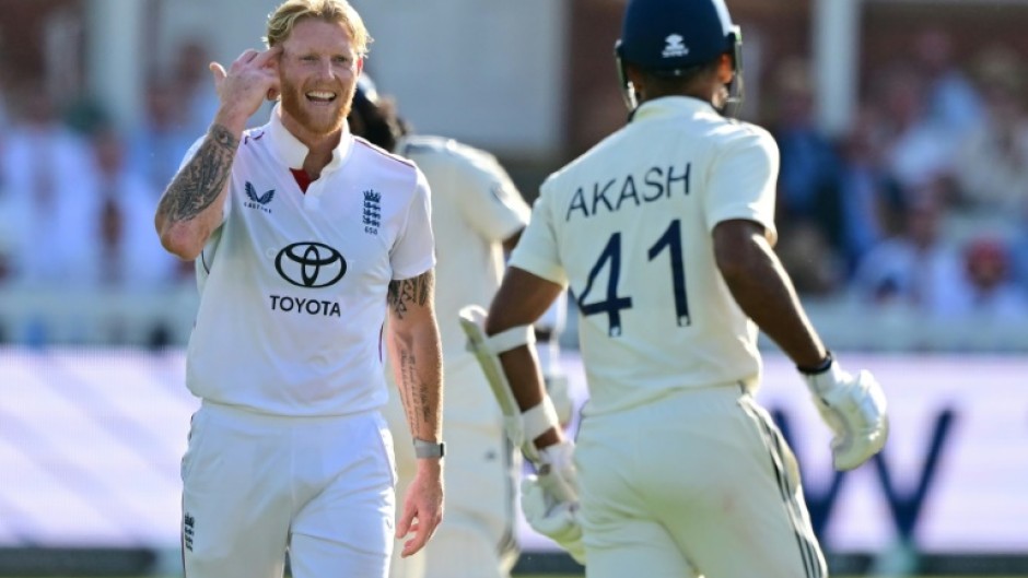 England captain Ben Stokes (L) gestures to India's Akash Deep